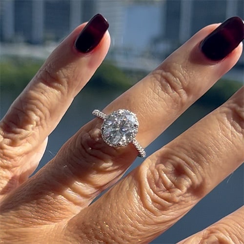 3.36 TCW Oval Moissanite Colorless Halo Side Stone Engagement Ring