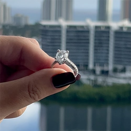 3.51 TCW Pear Moissanite Colorless Hidden Halo Side Stone Engagement Ring