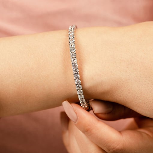 Shared Prong Oval Bangle