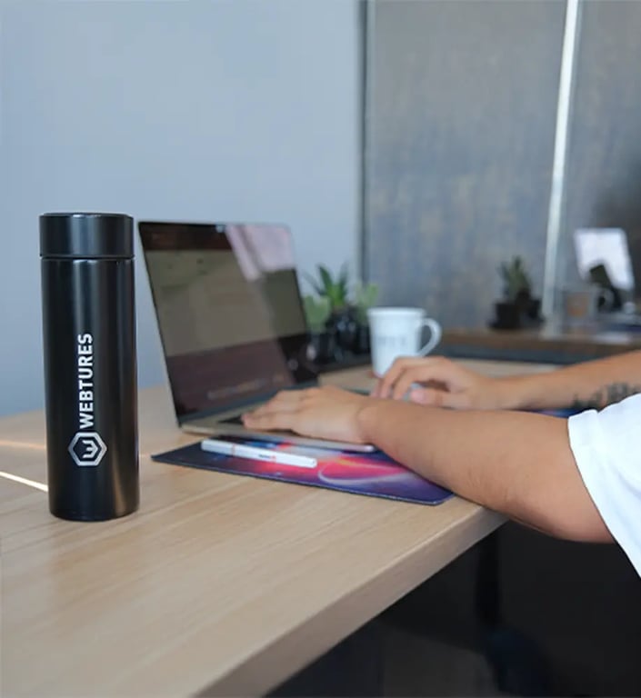 Webtures strategists collaborating around a desk