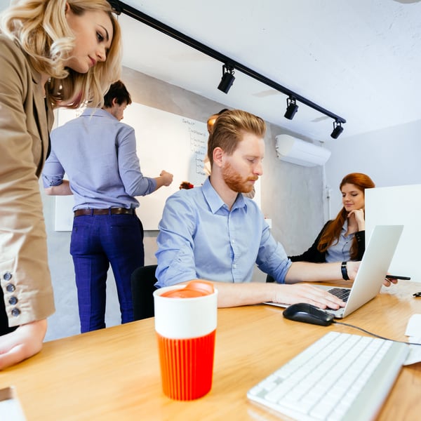 Business people collaborating in office and working on project together