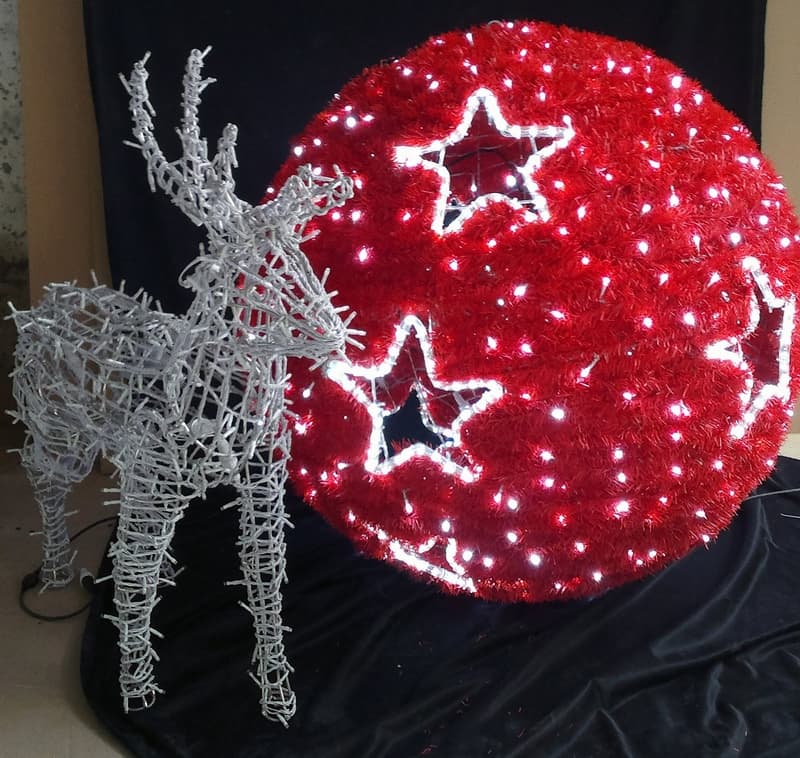 Sfera LED di Natale rossa con stelle