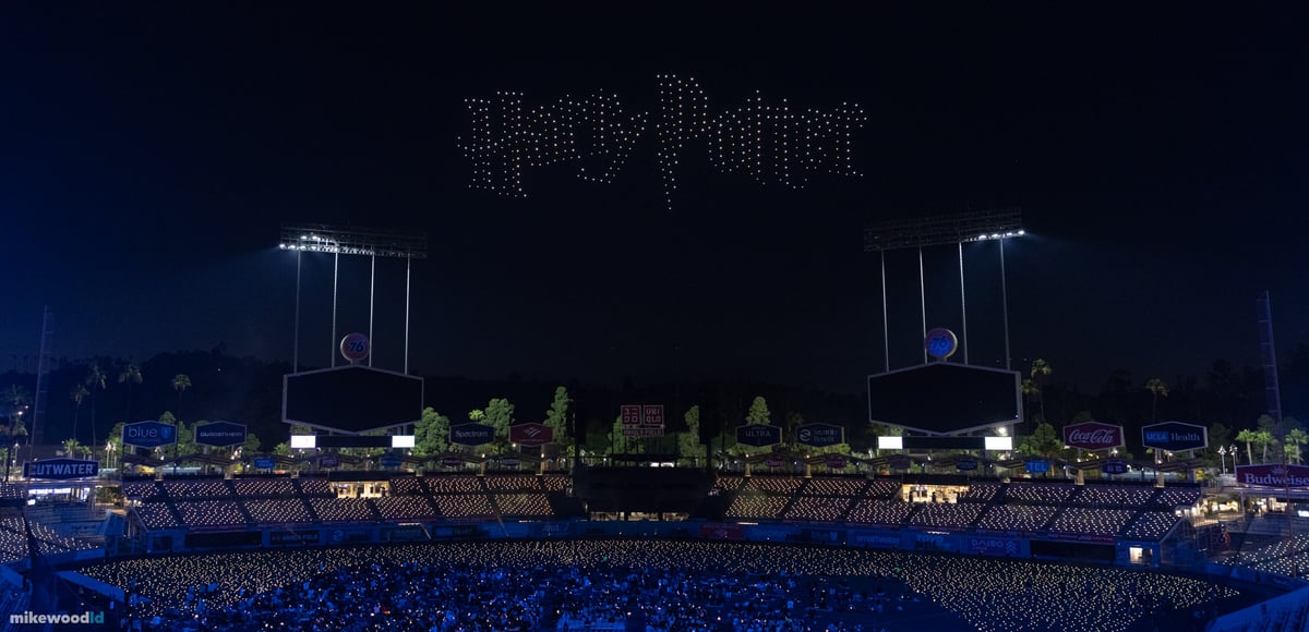 The Harry Potter title spelled out in white drones high above a packed Dodger Stadium, the stands washed in deep blue.