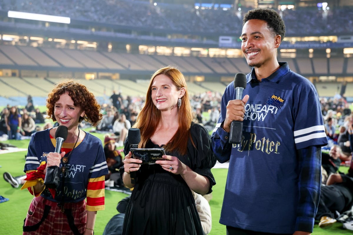 Bonnie Wright and two DroneArt Show hosts address the crowd from the field ahead of the Los Angeles tour launch.