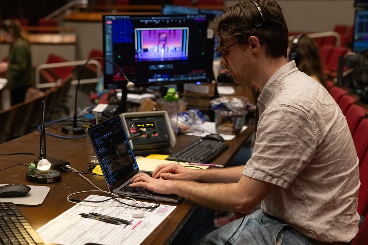 Working through the magic sheet at the tech table.