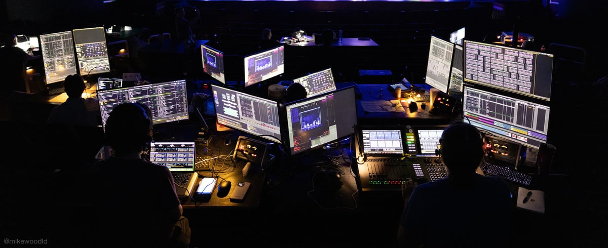 The glow of the tech tables across the dark house.