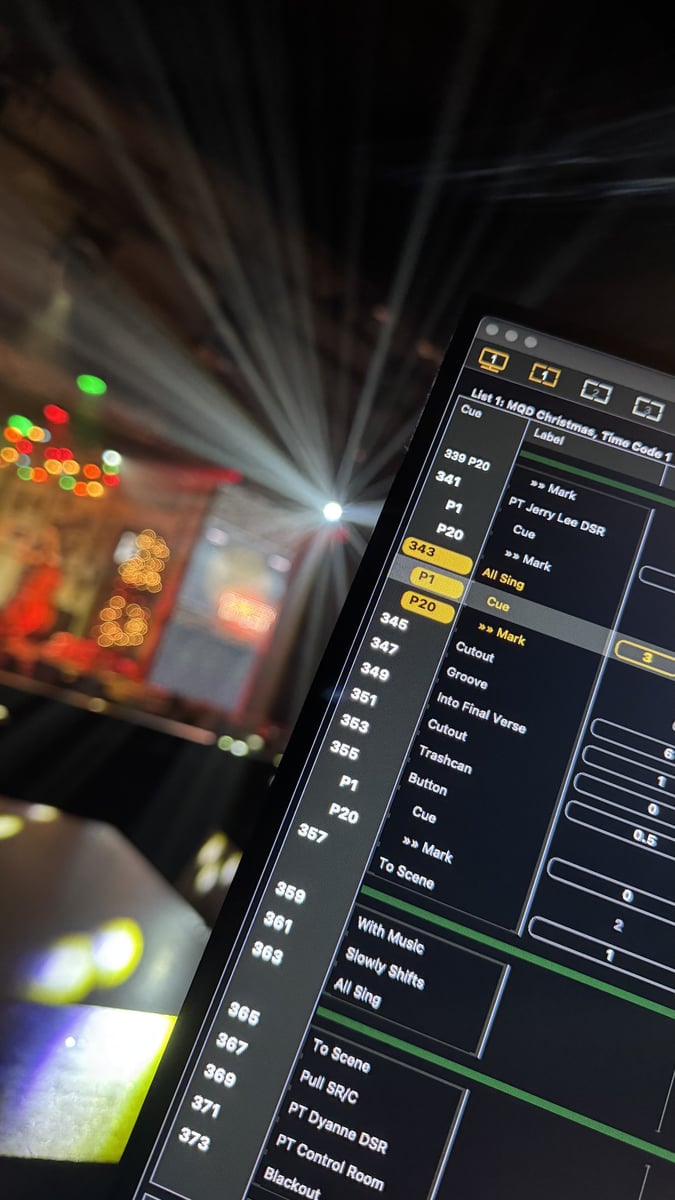 The Eos magic sheet on the tech monitor with the band's stage behind.