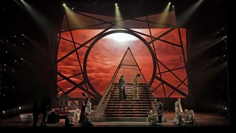 Daryl Freedman as Caesar and Jasmine Habersham as Cleopatra ascend the steps of the pyramid revolve