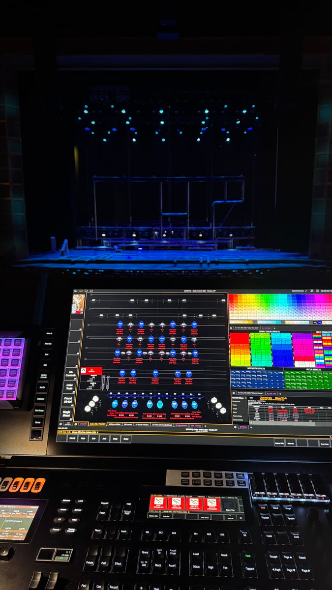 Eos magic sheet detail with color palette during Siegfried tech, looking out at the stage with the bluish-lit set being tech'd