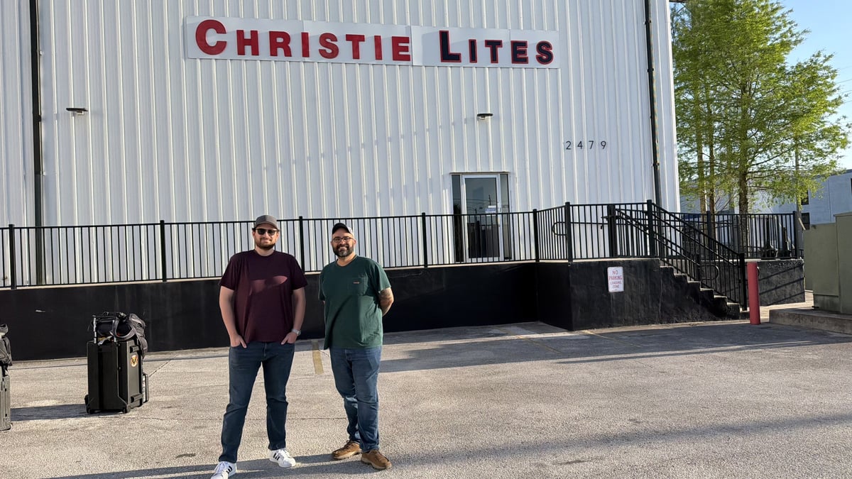 Two of the team outside the Christie Lites lighting shop.