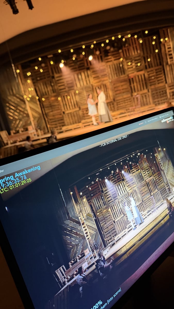 From the tech table: the warmly lit pallet-wall set above and a monitor below showing the Vor capture of the same scene