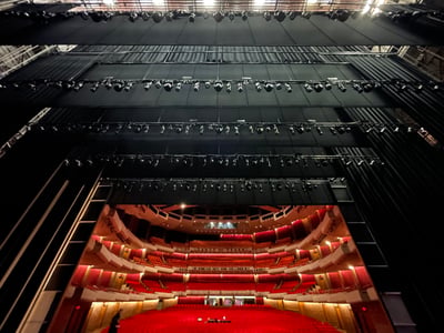 The Straz Center auditorium seen from the grid, with the house rep plot hung on the overhead electrics