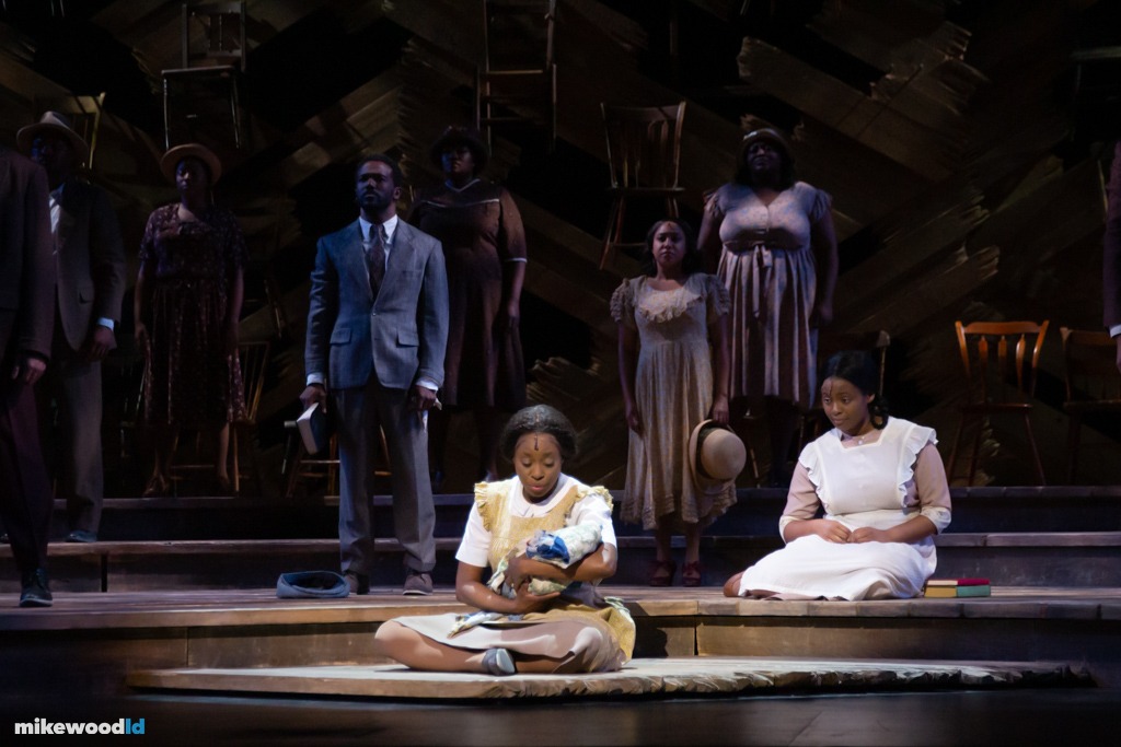 The Color Purple, visible booms and overhead rig creating a wraparound surround on the unit set.