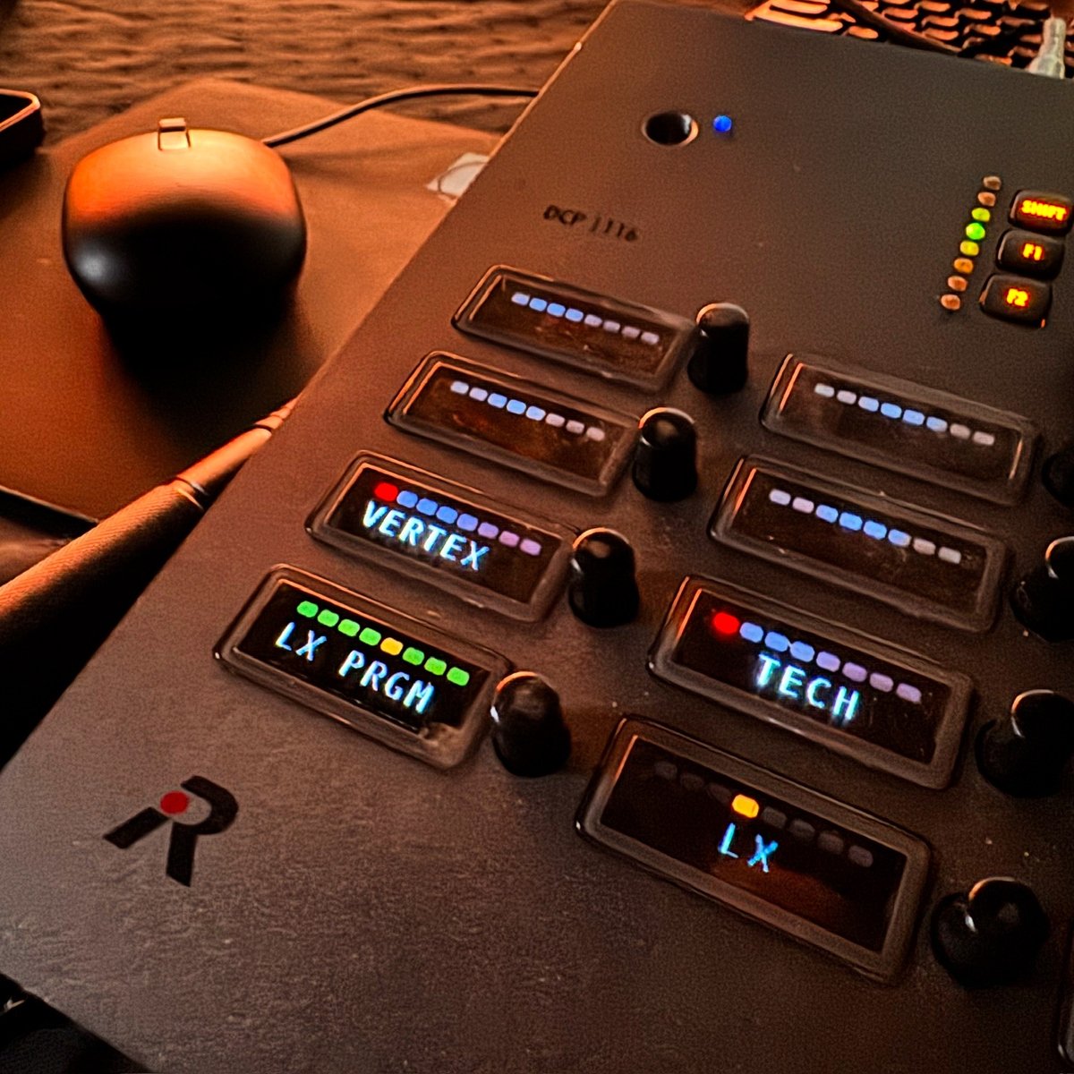 Custom macro buttons on the Eos programming wing, labeled for the show.