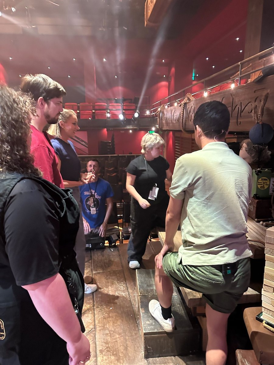 The team gathered in the house during tech.