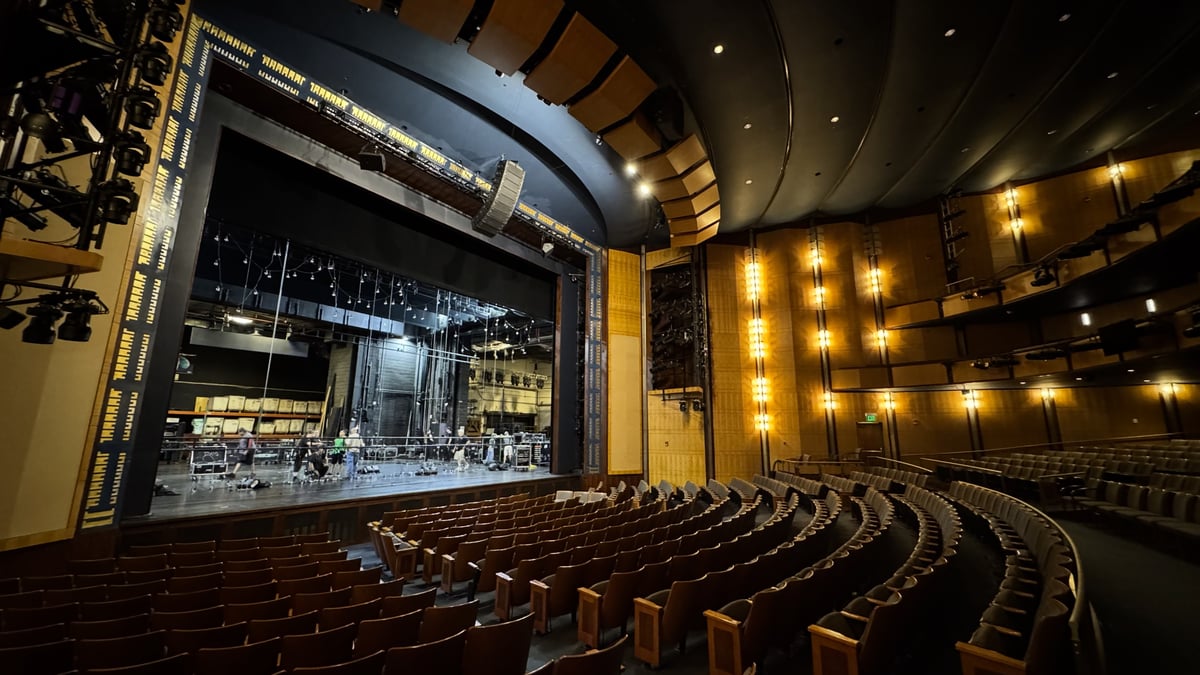 The ornate house seen from the stage at a tour stop.