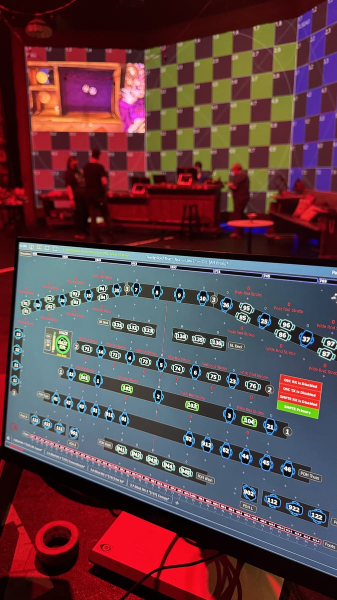 A tech table set up in the house during load-in.