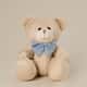 Urso de Pelúcia Bege com Laço Azul 22cm - imagem 1