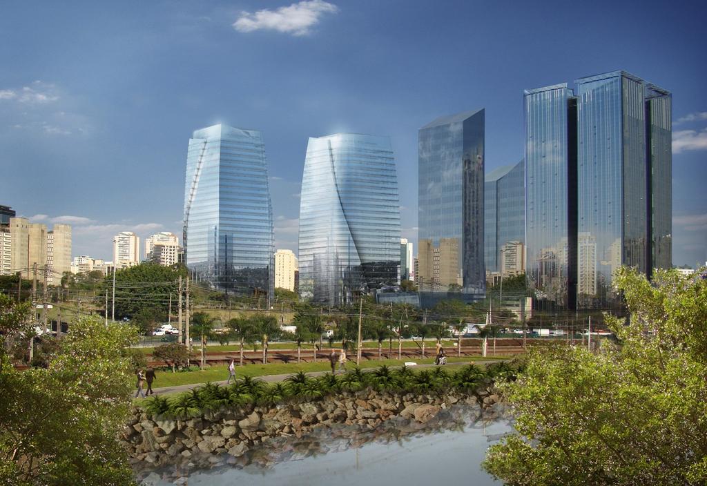 Horizonte urbano de São Paulo ao entardecer, com prédios e via expressa