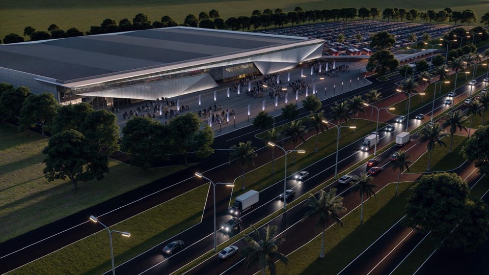 Cena urbana com prédio público moderno e circulação de pessoas, ilustrando serviços públicos em município capixaba