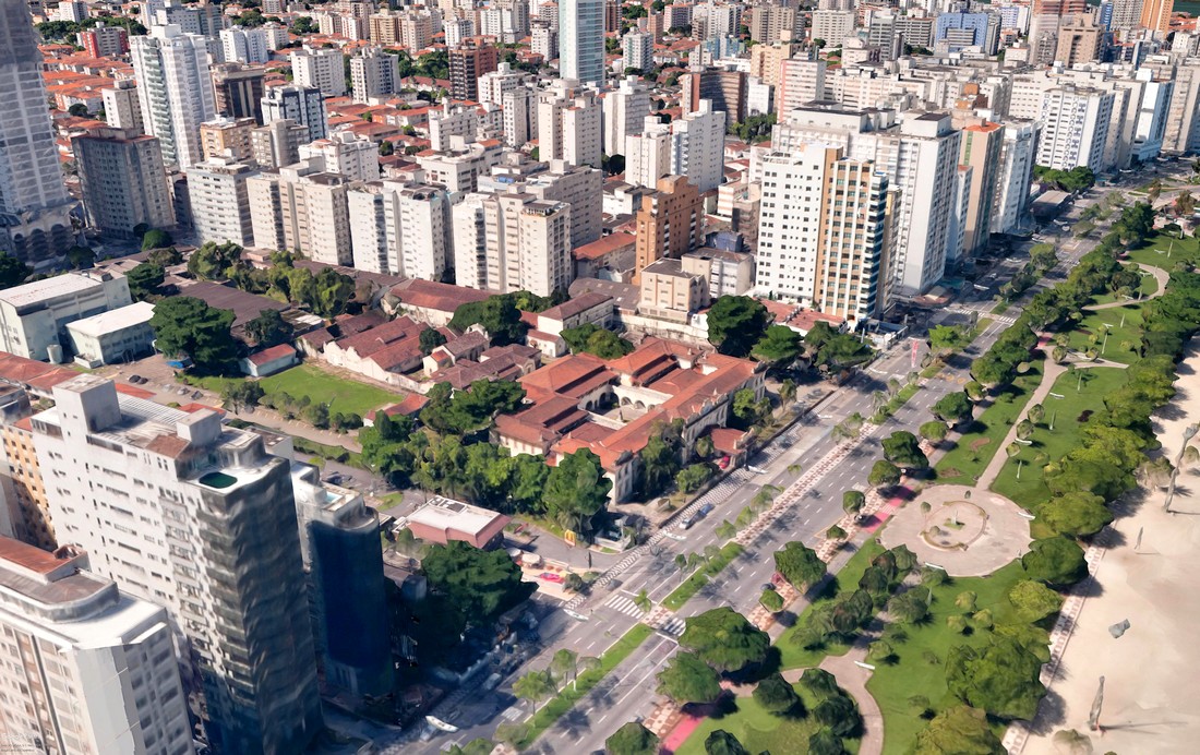 Fachada histórica da Etec Dona Escolástica Rosa, com árvores ao redor