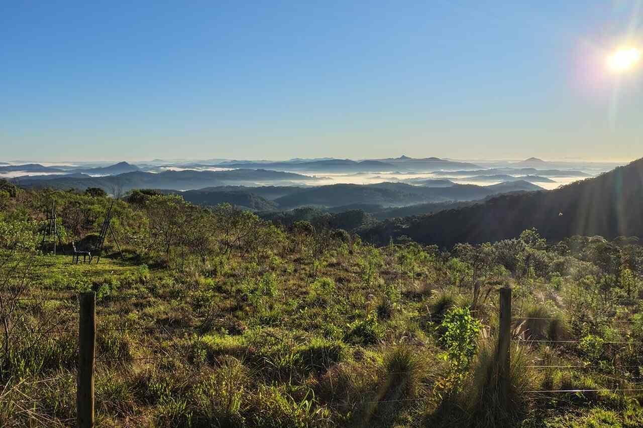 Campos de São Luiz do Purunã ao pôr do sol, com a Escarpa Devoniana ao fundo