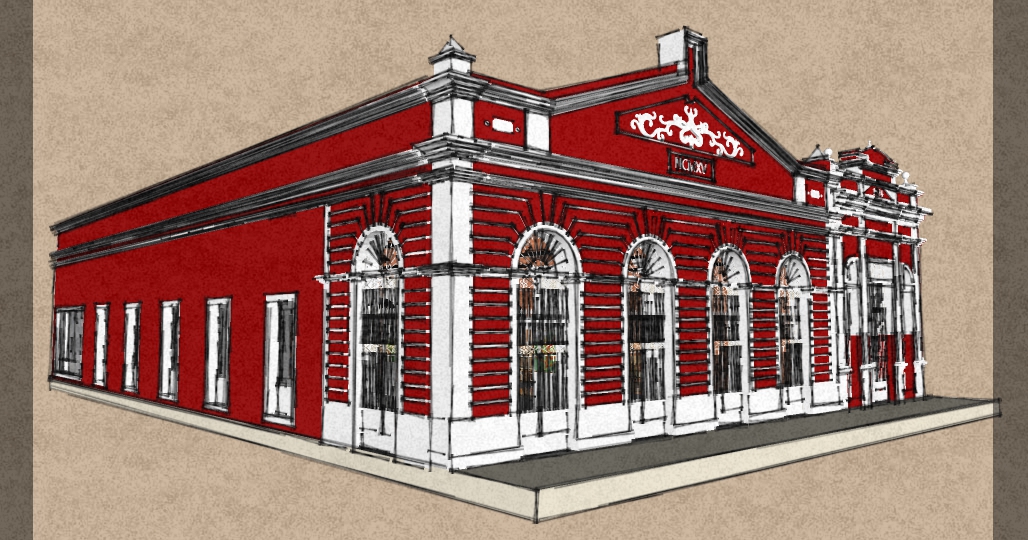 Prédio público municipal com arquitetura típica em vermelho