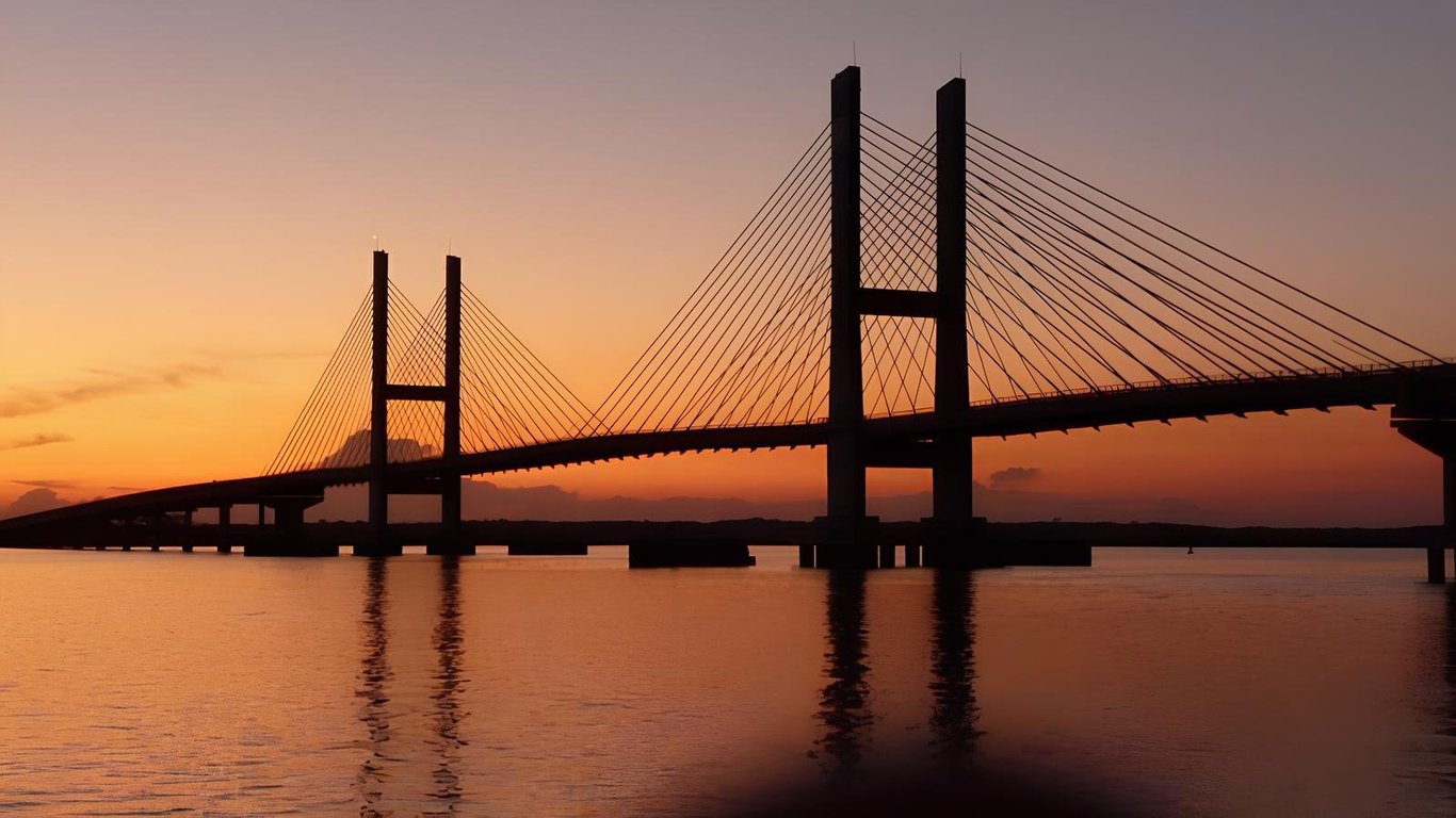 Paisagem do Pontal do Paranapanema, com ponte sobre o rio e vegetação ao entardecer
