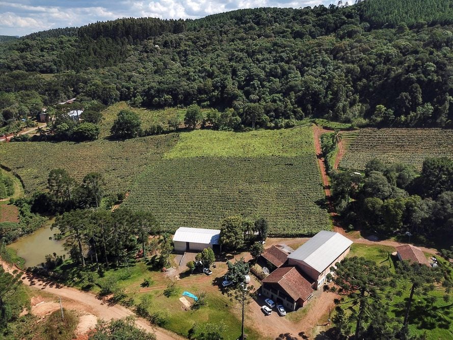 Vista aérea de Bituruna PR, com áreas de cultivo e zona urbana ao fundo