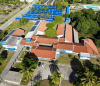 Vista aérea do campus da Universidade Federal de Sergipe em São Cristóvão, com prédios e áreas verdes.