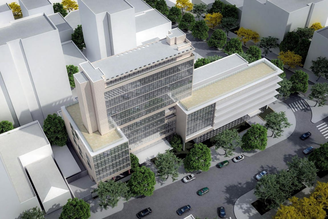 Edifício moderno em campus universitário no Brasil, com áreas verdes e vagas de estacionamento