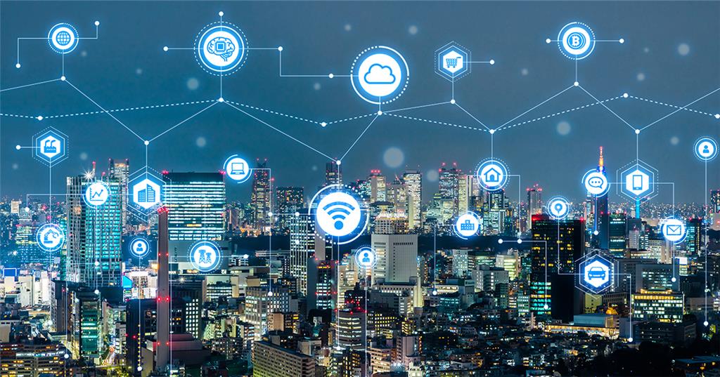 Vista urbana de São Paulo à noite com elementos de tecnologia