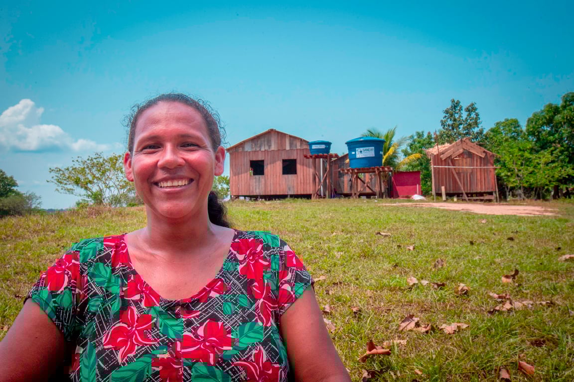 Agente comunitária de saúde em visita domiciliar