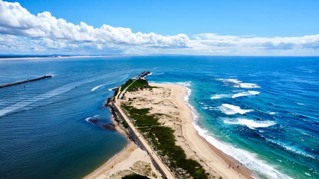 Nobbys Beach and the breakwater, Newcastle, from the air