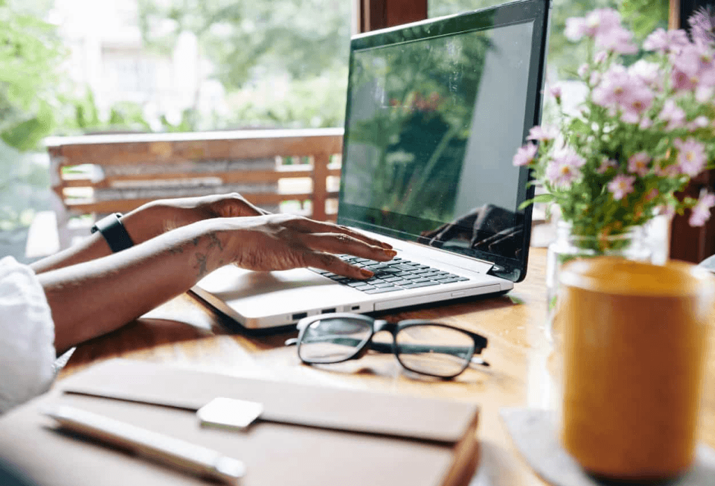 a virtual medical receptionist working on her laptop