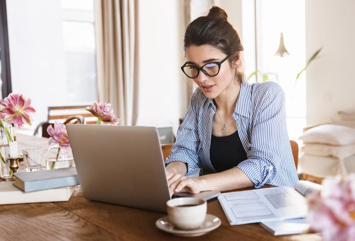 virtual assistant working on her laptop