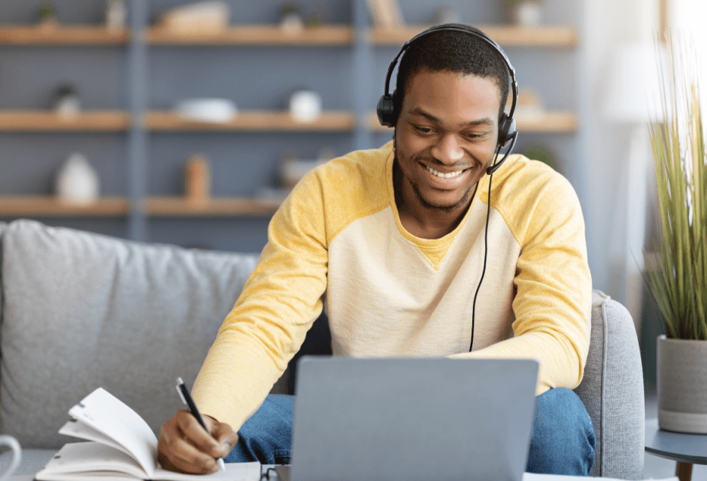 a virtual assistant taking courses on his laptop