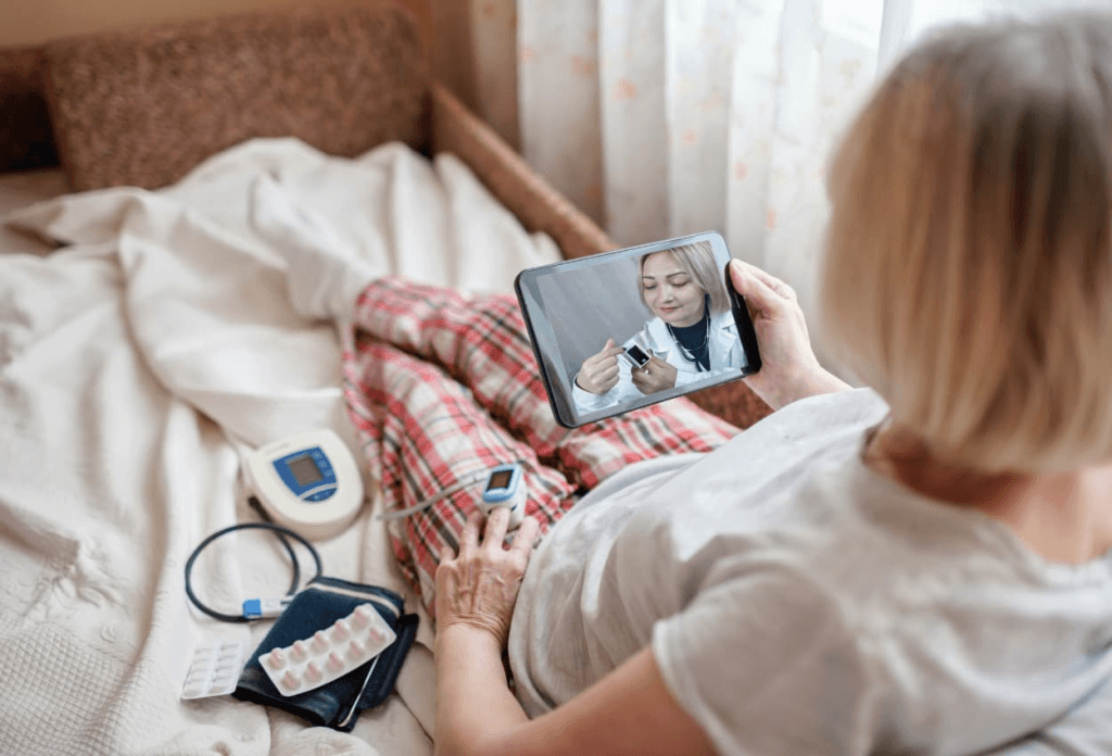 a patient is talking to a virtual medical receptionist on her tablet