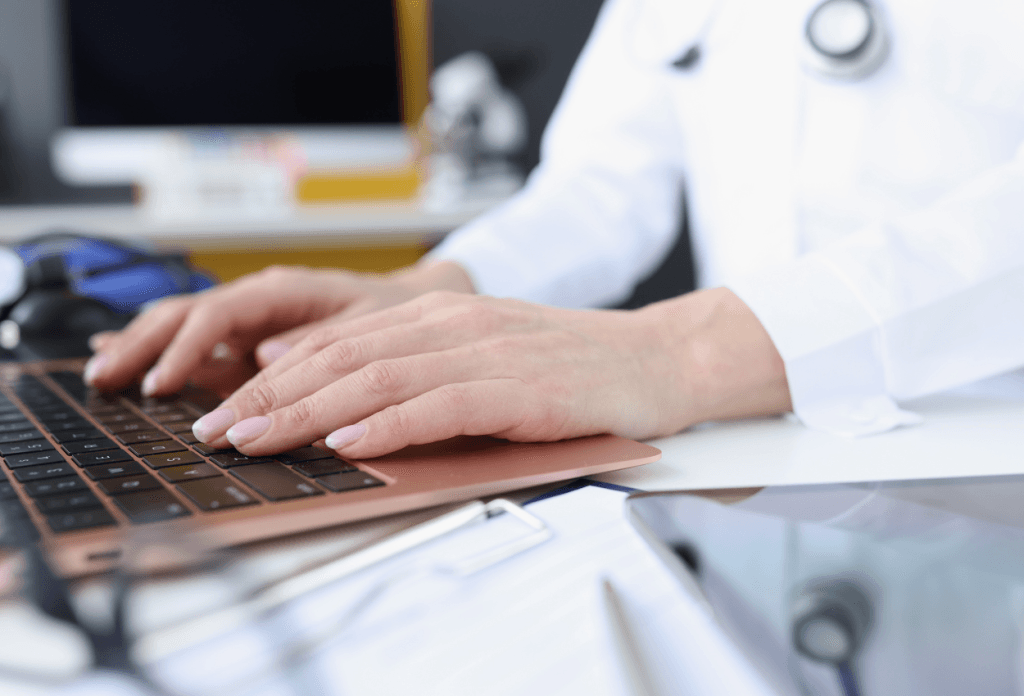 medical virtual assistant working on her laptop