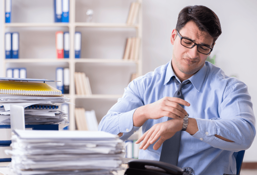 a busy professional working on his workspace