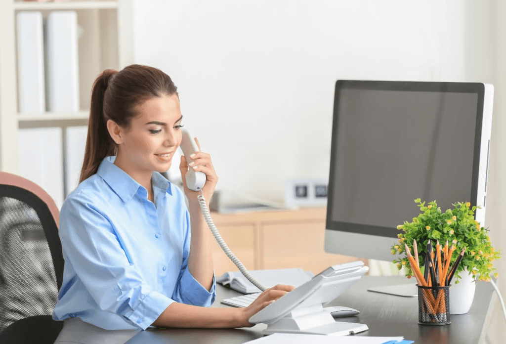 healthcare assistant talking to a patient over the phone