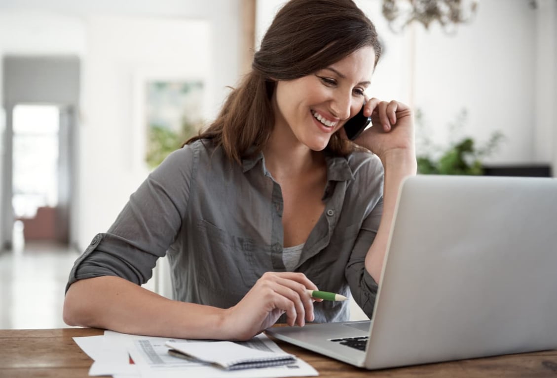 remote assistant working in her laptop