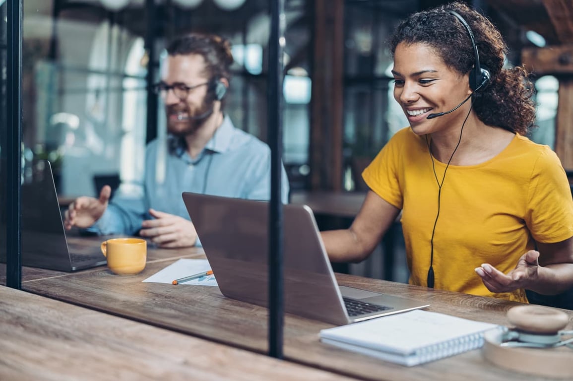 employees smiling while working