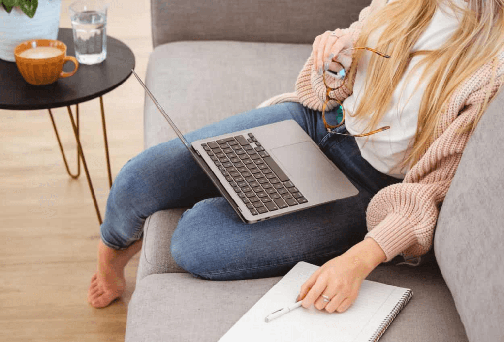virtual assistant medical receptionist working with her laptop