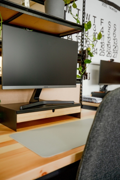 A dedicated desk in a creative video agency office photo 3
