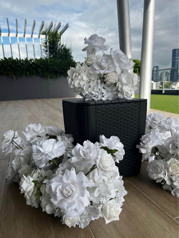 HIRE - $20 each white floral centrepieces photo 4