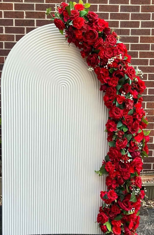 Hire - ripple arch with 2M flowers panel $125 Ripple plinth $25 photo 5