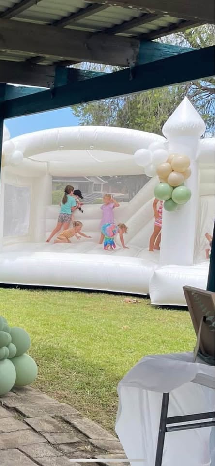 Luxe White Jumping castle for hire 5x5 photo 5
