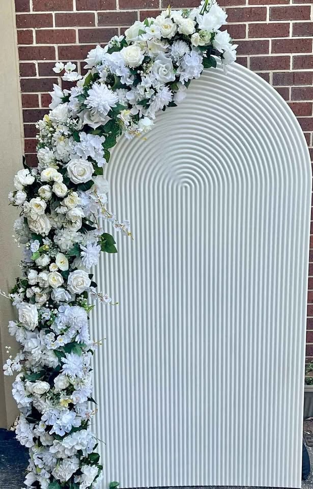Hire - ripple arch with 2M flowers panel $125 Ripple plinth $25 photo 6