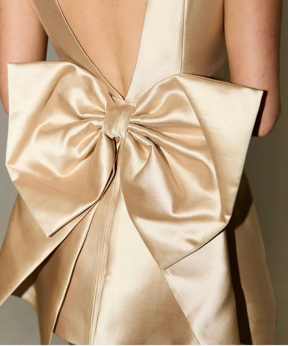 The Ultimate Muse Bow Detail Mini Dress Gold Size 10 photo 3